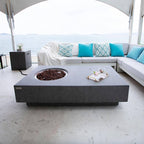 Metropolis Outdoor Fire Pit 56 In. X 32 In. Rectangular Concrete Propane Fire Table with Lava Rocks and Cover